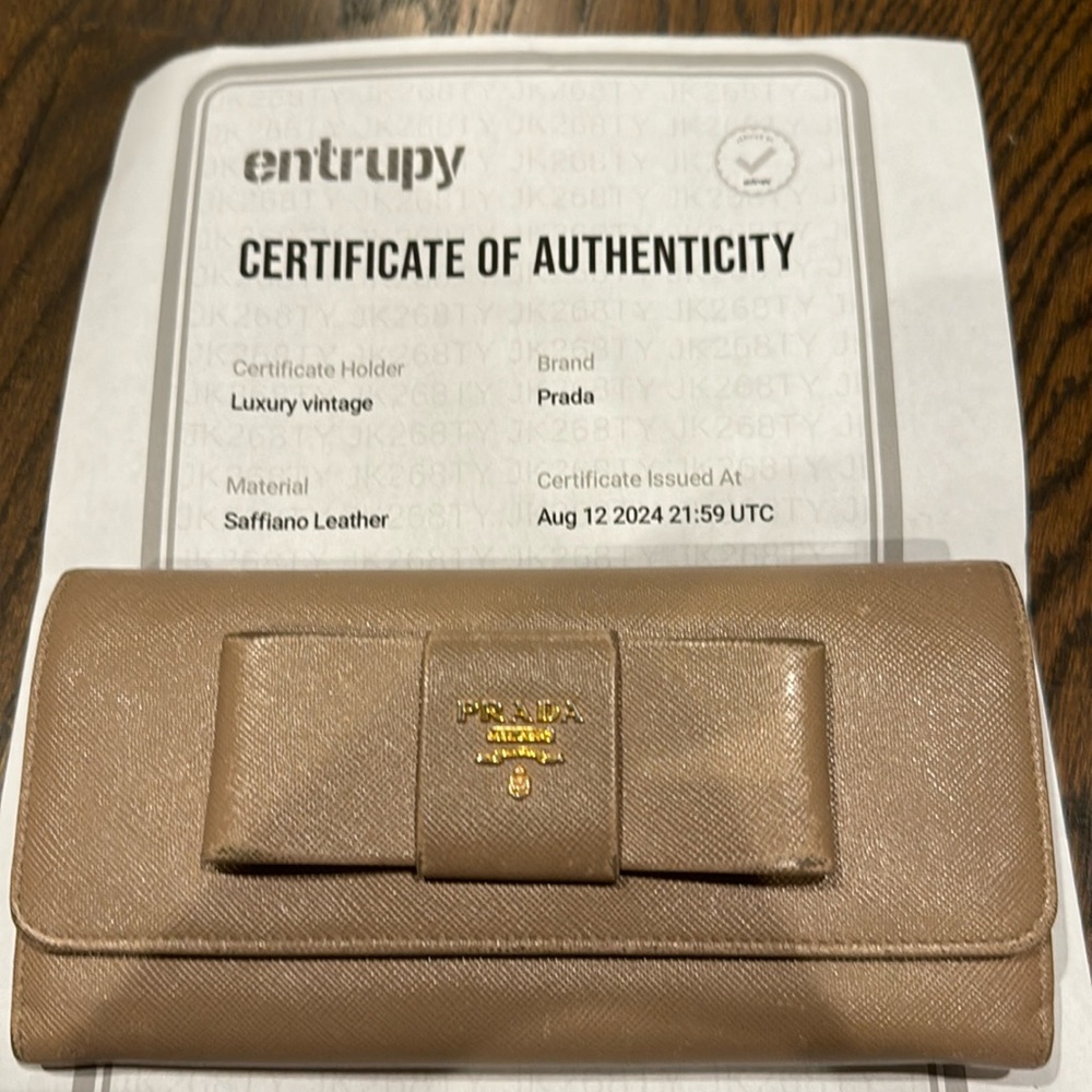 Authentic Prada tan Saffiano Leather bow wallet